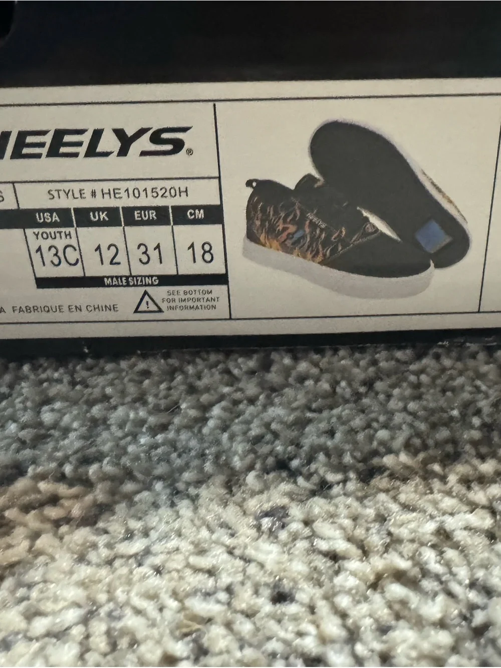 Heelys Kids Black Sneakers with Orange Flame Design